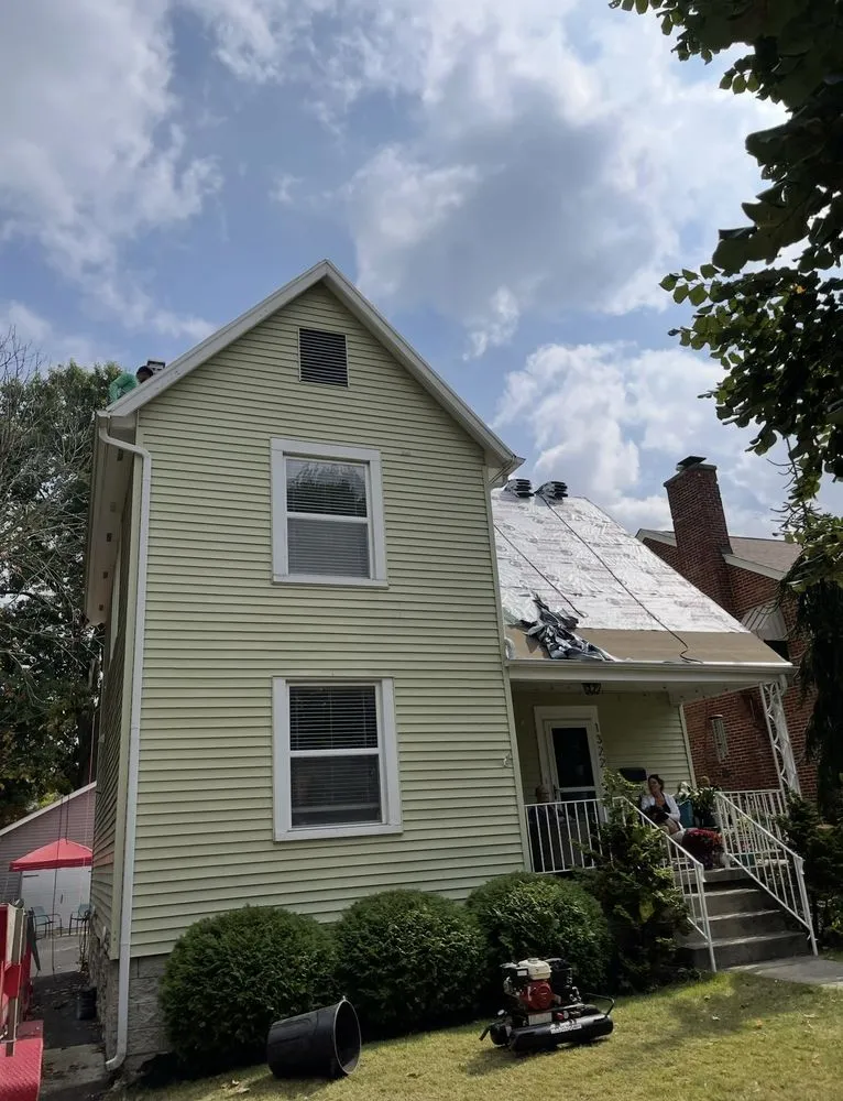 Slide of J D Flora Roofing