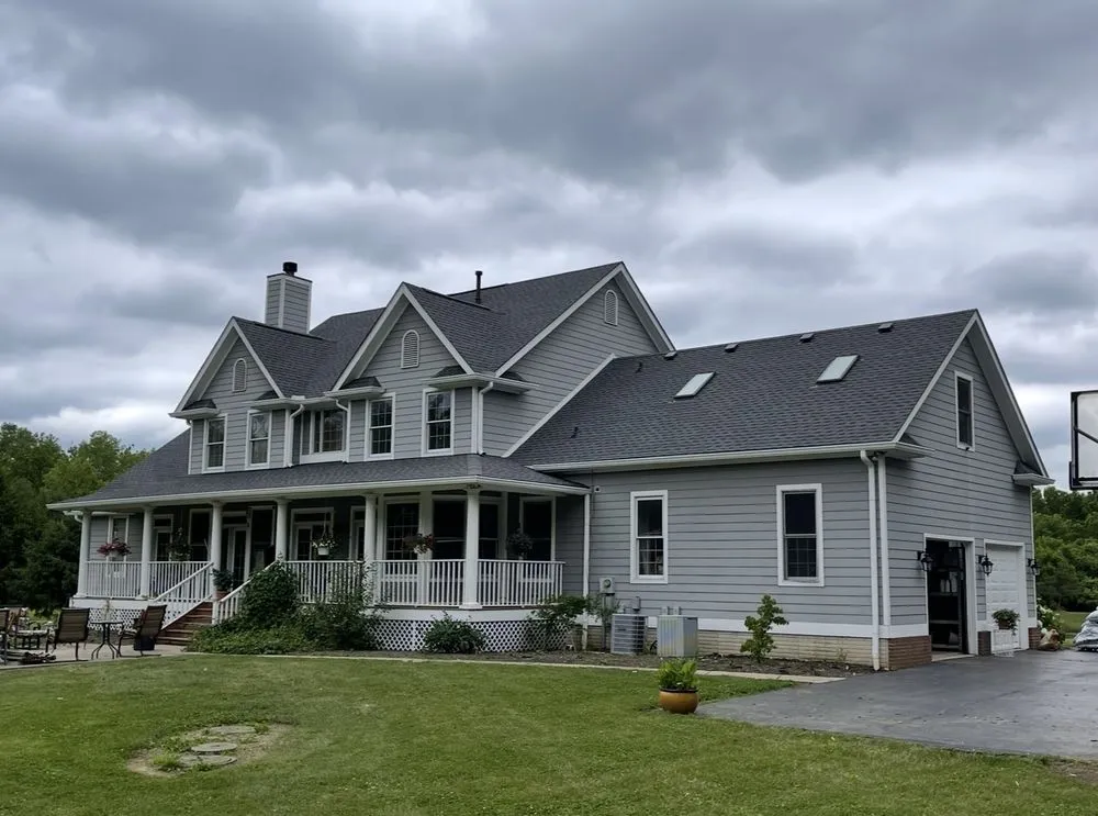 Slide of J D Flora Roofing