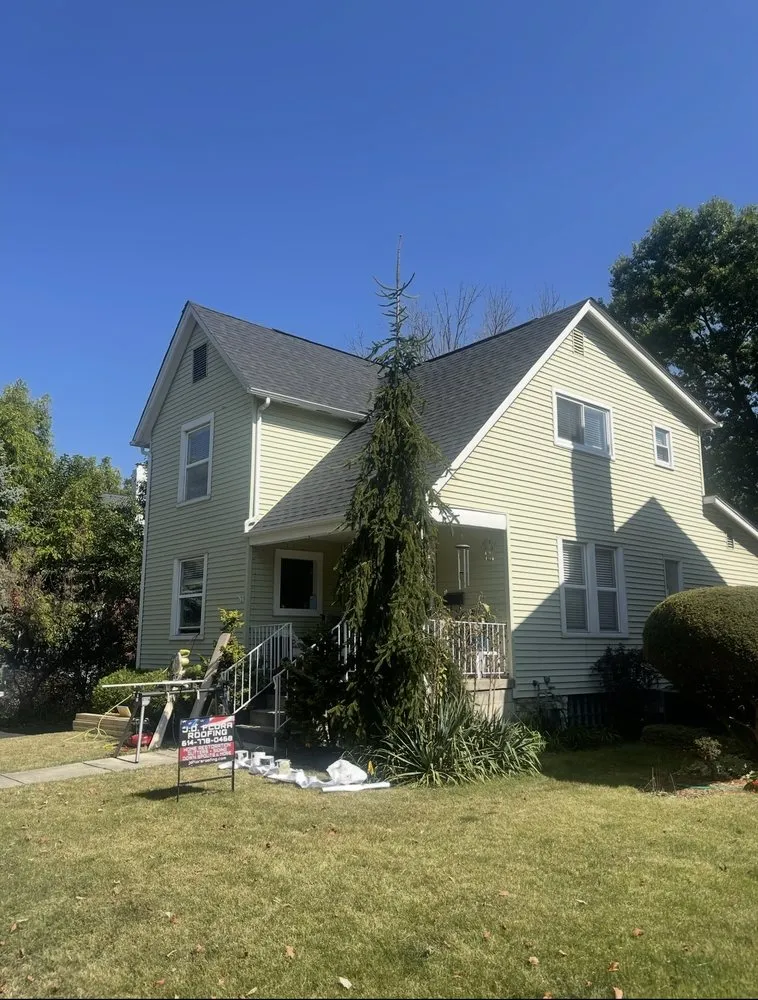 Slide of J D Flora Roofing