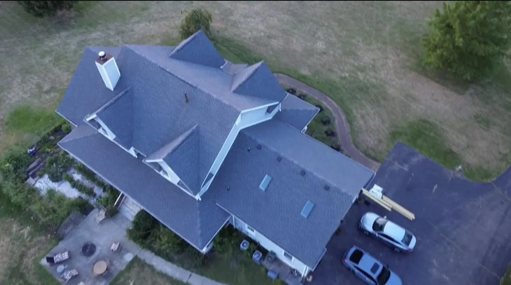 Slide of J D Flora Roofing