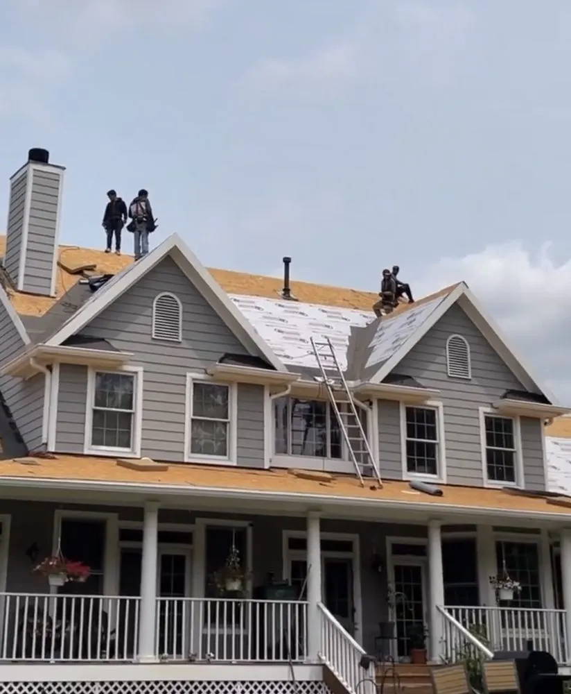 Slide of J D Flora Roofing