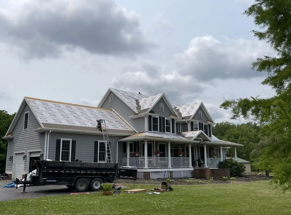 Slide of J D Flora Roofing