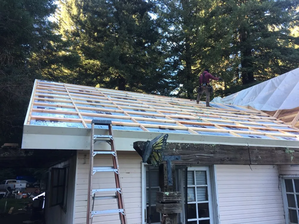 Slide of J E Johnson Roofing