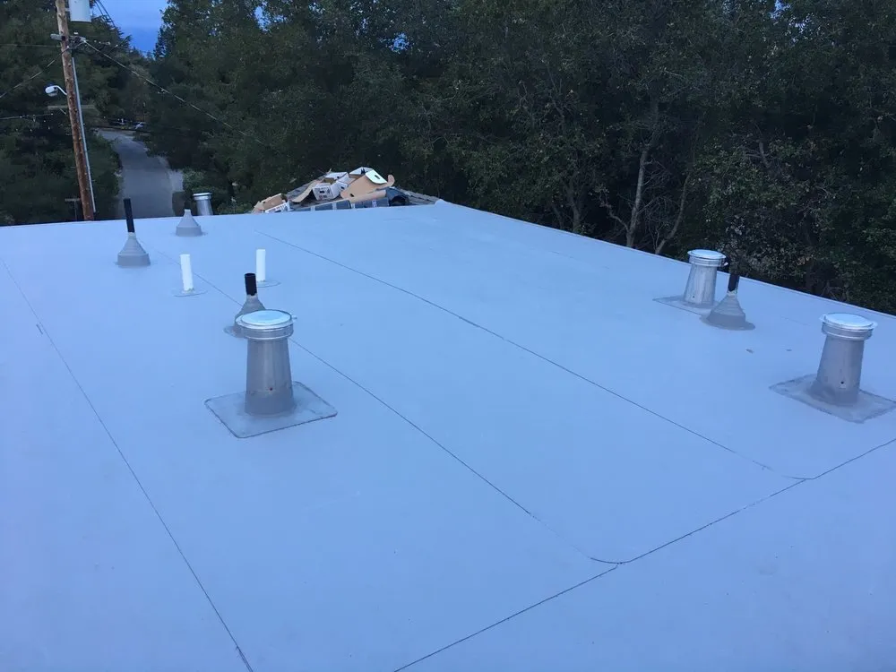 Slide of J E Johnson Roofing