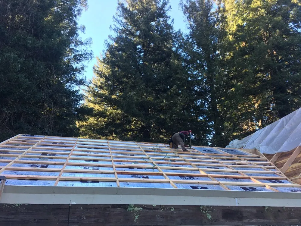 Slide of J E Johnson Roofing