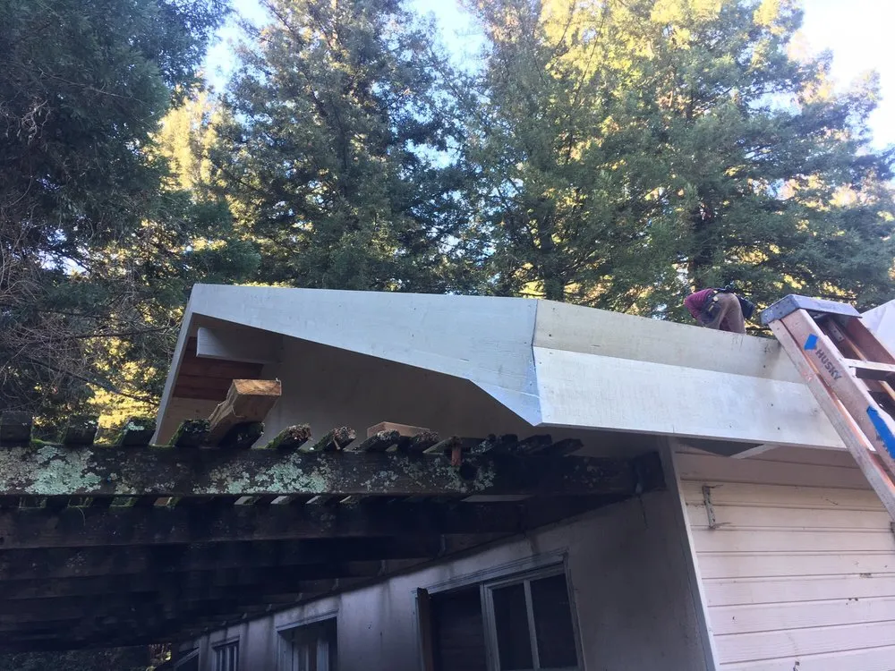 Slide of J E Johnson Roofing