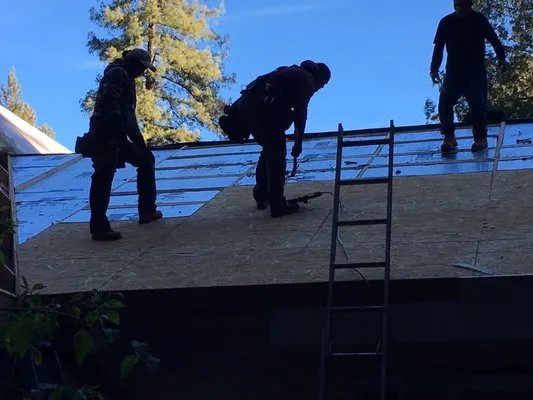 J E Johnson Roofing Logo