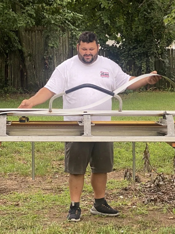 Slide of J. Evans Roofing