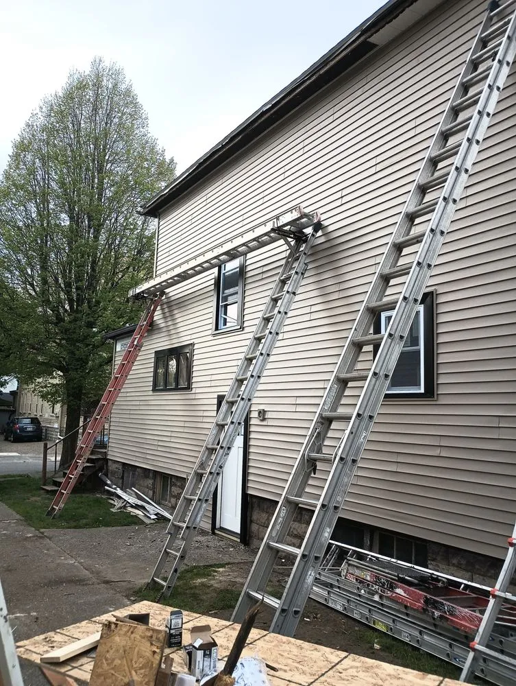 Slide of J F Roofing Construction
