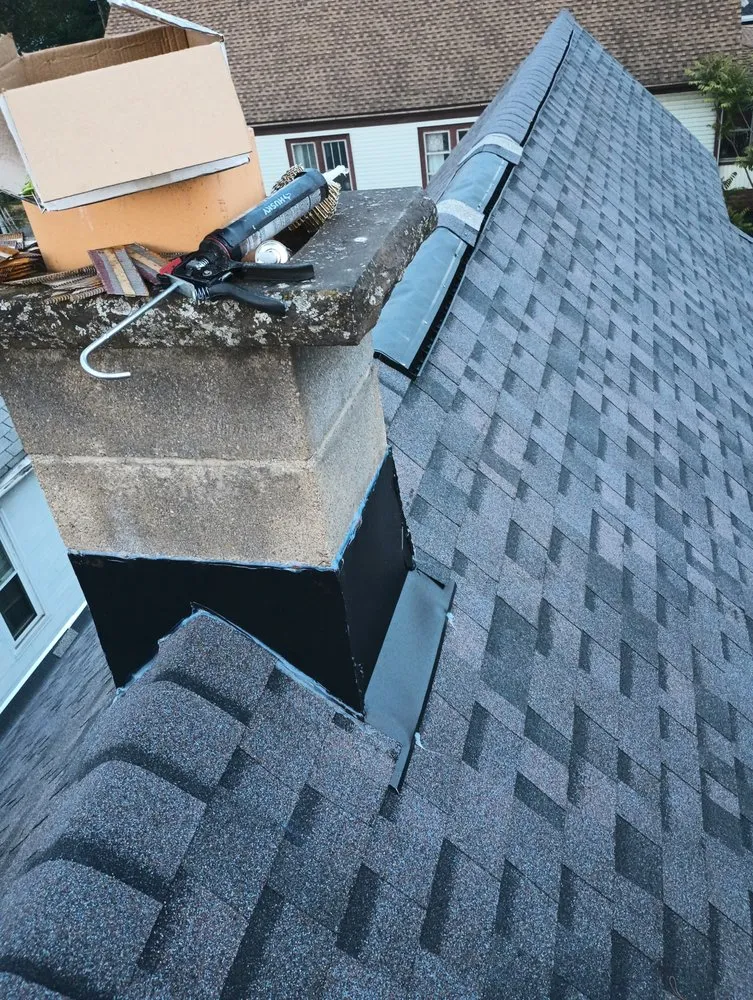 Slide of J F Roofing Construction