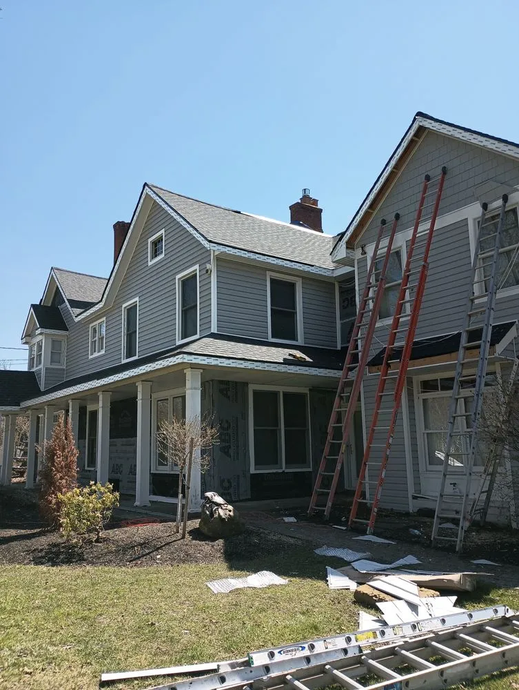 Slide of J F Roofing Construction