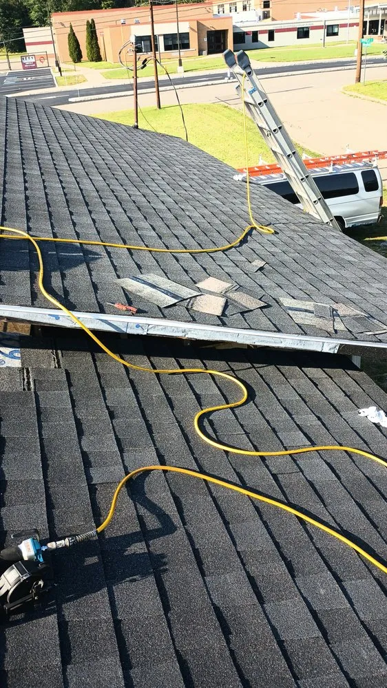 Slide of J F Roofing Construction