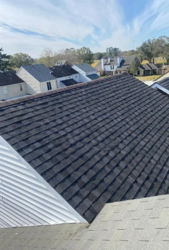 Slide of J Hebert Roofing