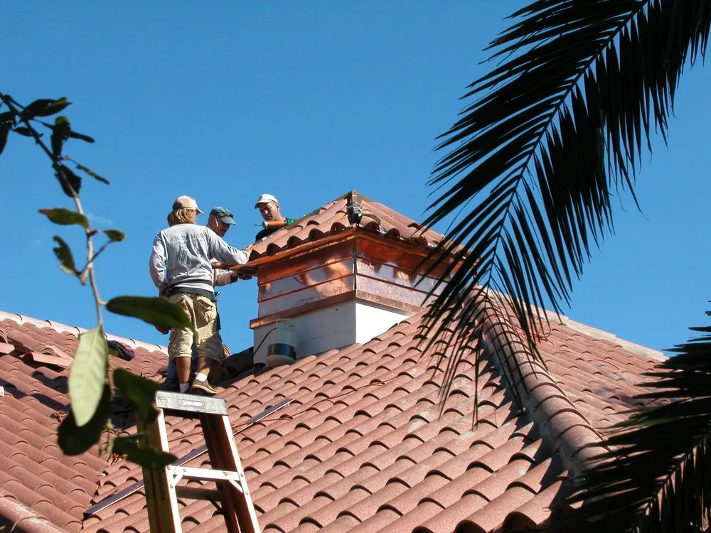 Slide of J K Behan Roofing