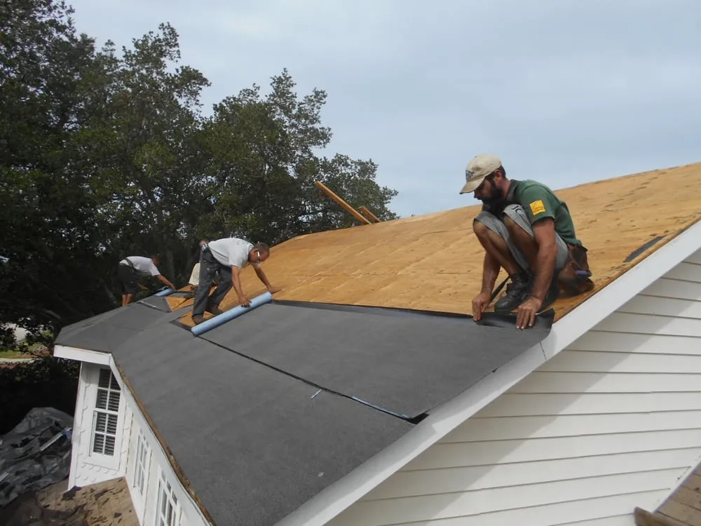 Slide of J K Behan Roofing