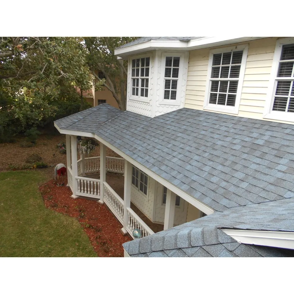 Slide of J K Behan Roofing