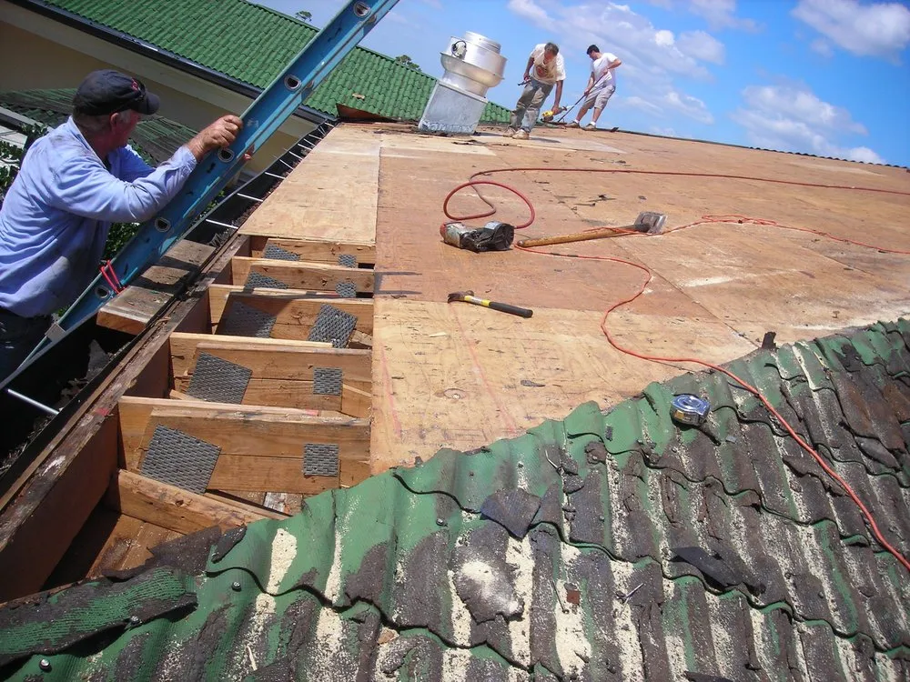 Slide of J K Behan Roofing