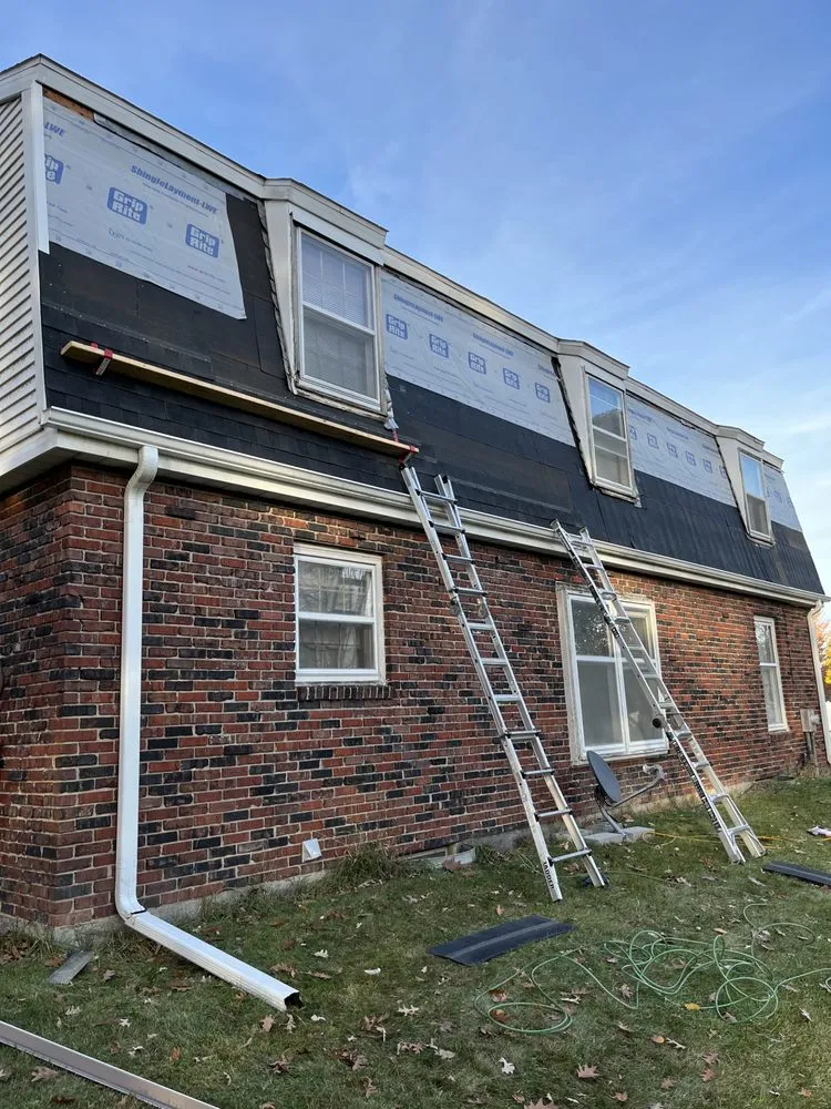 Slide of J-K Roofing