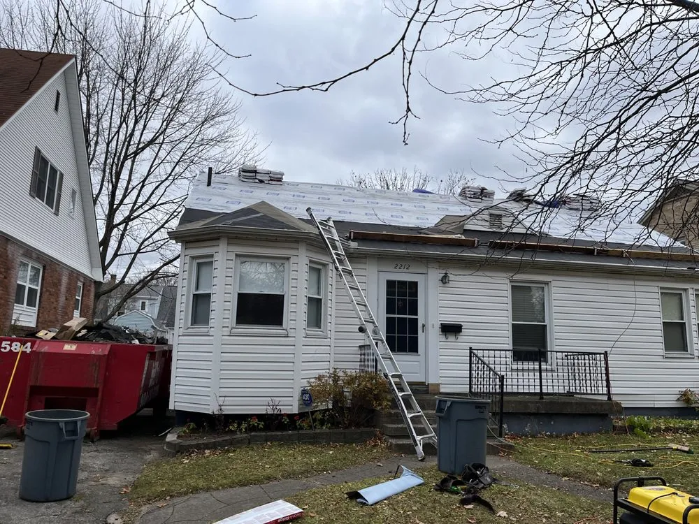 Slide of J-K Roofing