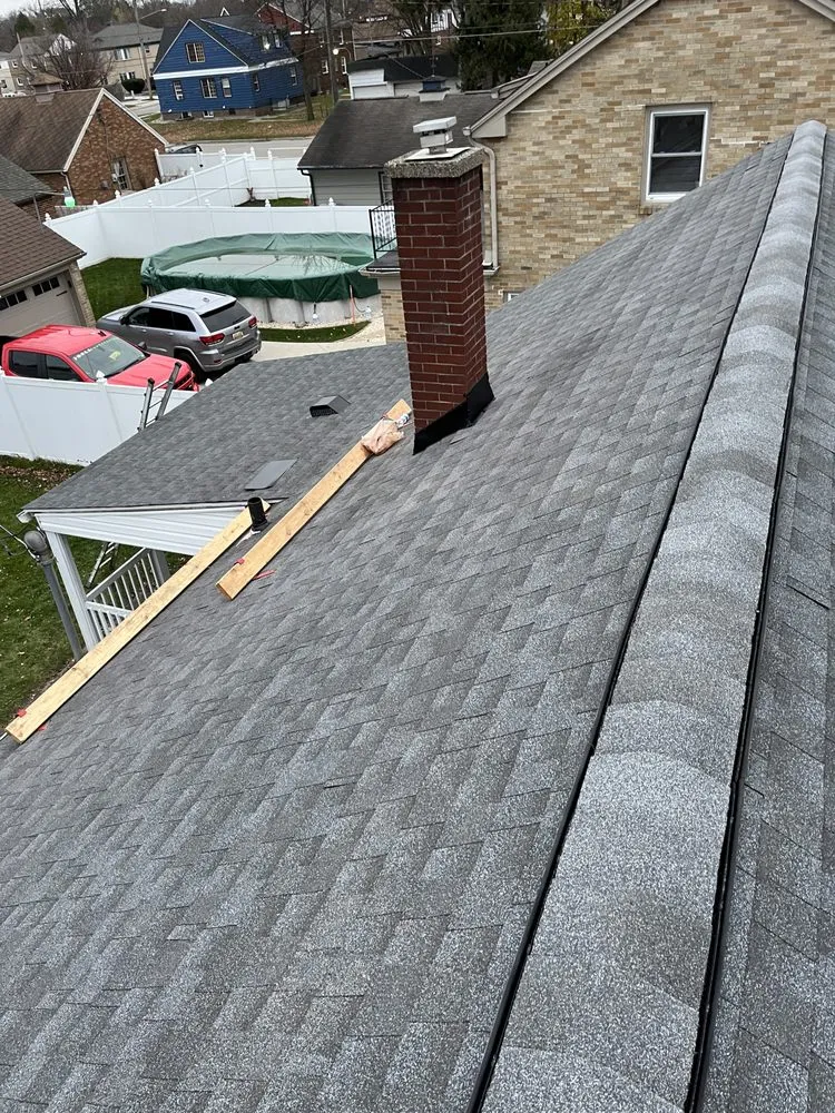 Slide of J-K Roofing