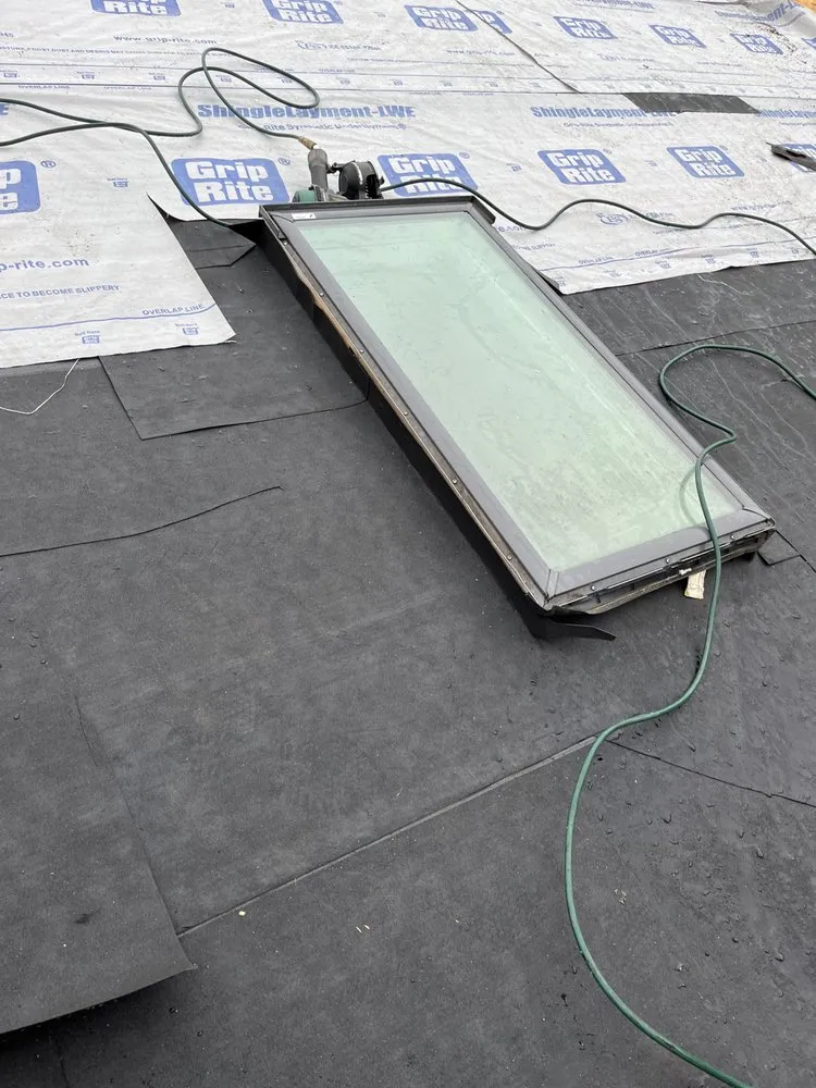 Slide of J-K Roofing