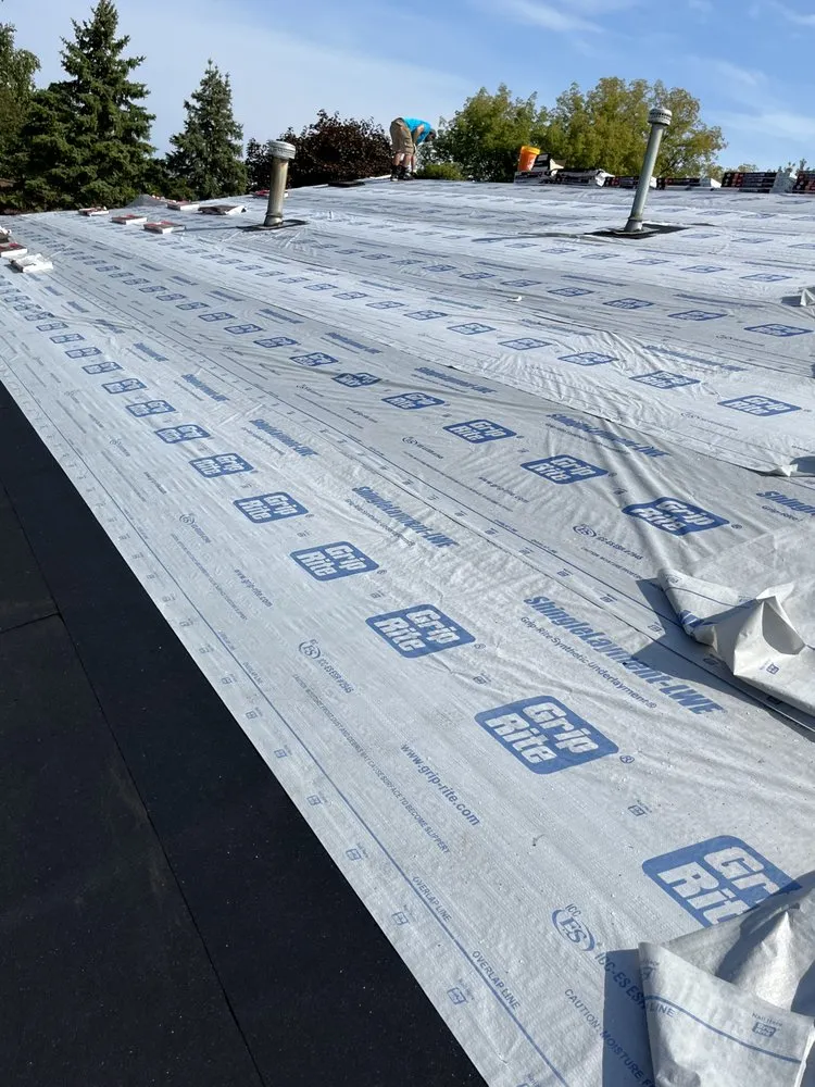 Slide of J-K Roofing