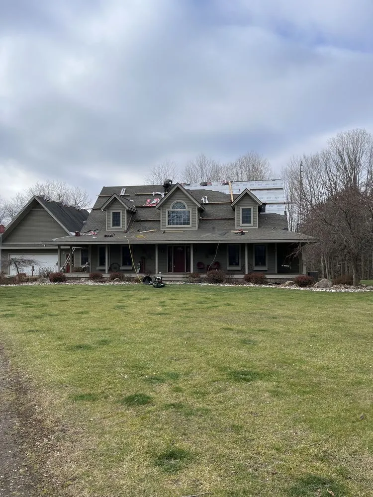 Slide of J-K Roofing