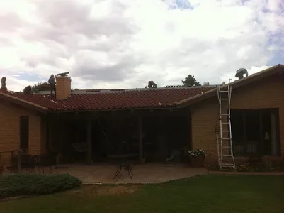 Slide of J M Roofing