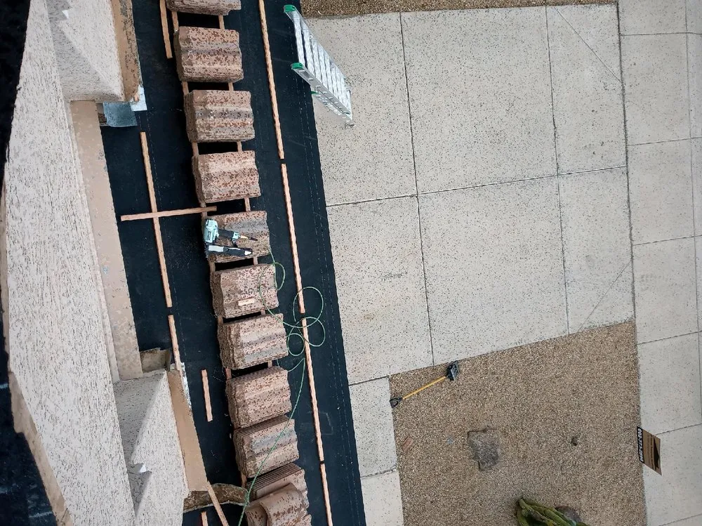 Slide of J-MAR Roofing