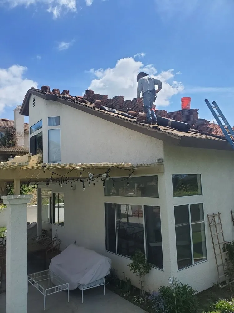 Slide of J P Roofing