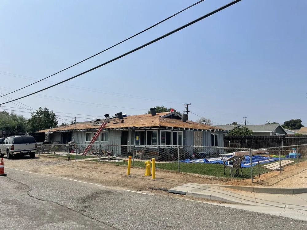 Slide of J P Roofing