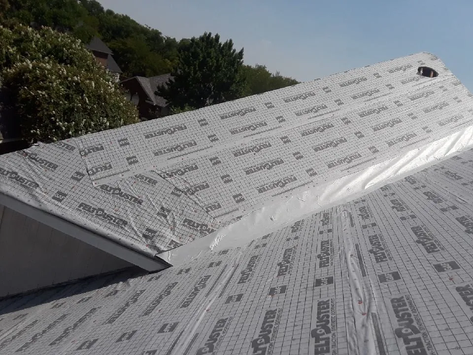 Slide of J Riley Roofing