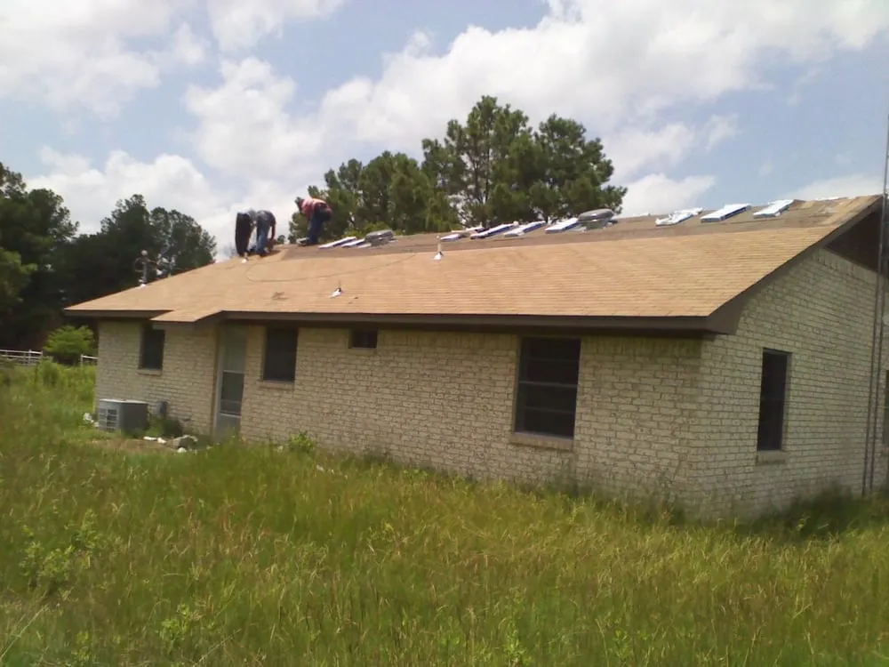 Slide of J Riley Roofing