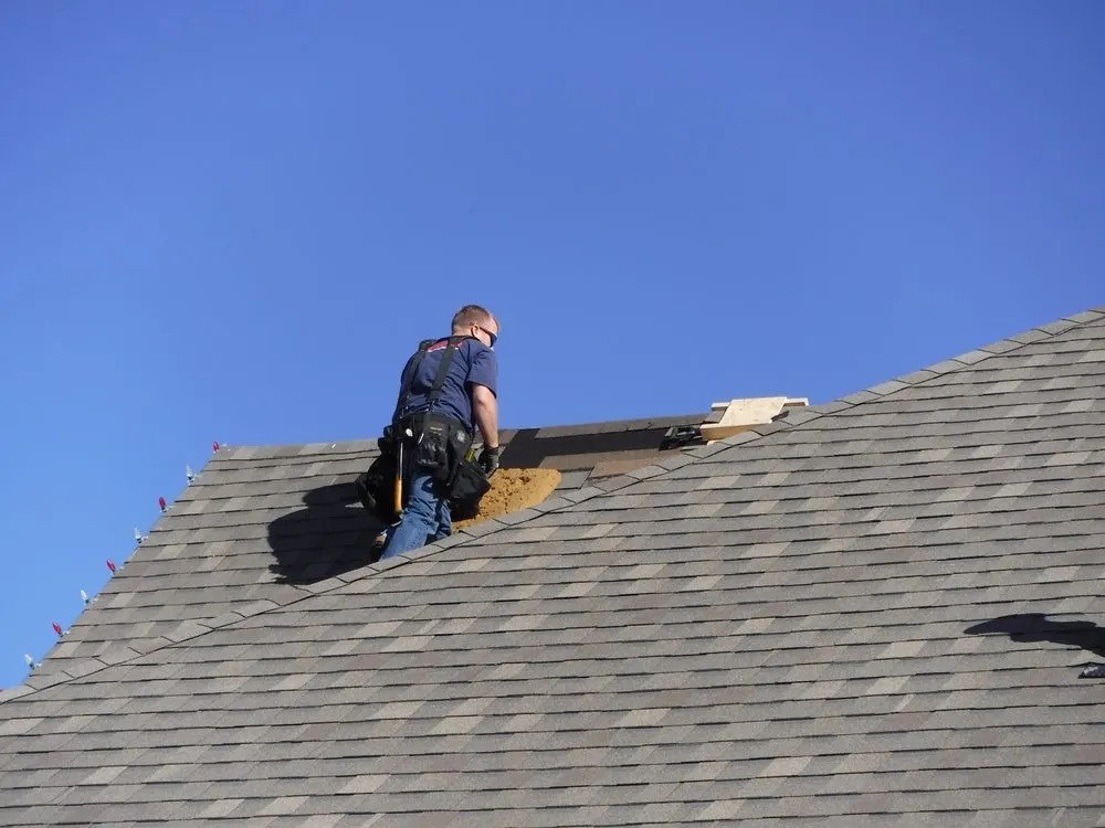 Slide of J Riley Roofing