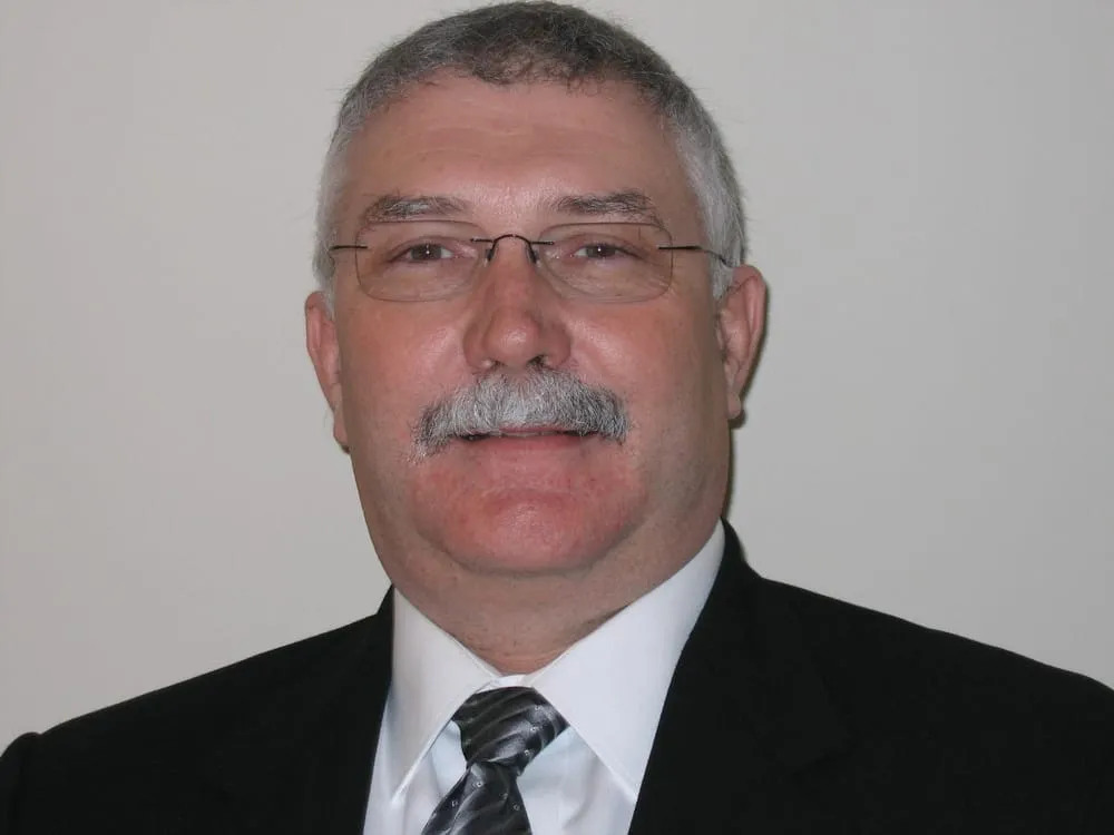 Slide of J Trent & Associates