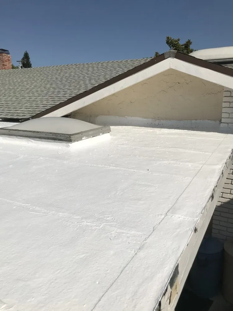 Slide of J V Roofing