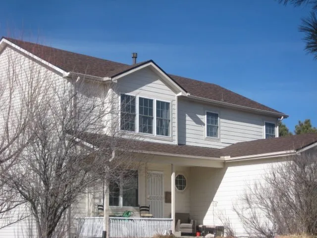 Slide of Jack Caton Roofing Team