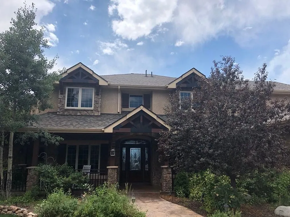 Slide of Jack Caton Roofing Team