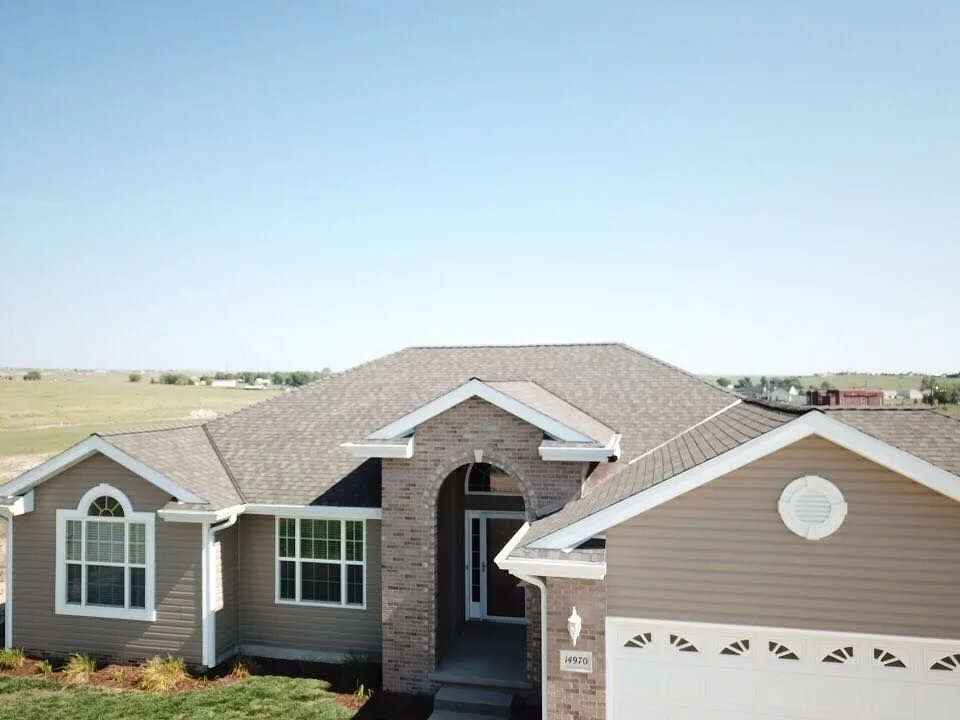 Slide of Jack Caton Roofing Team