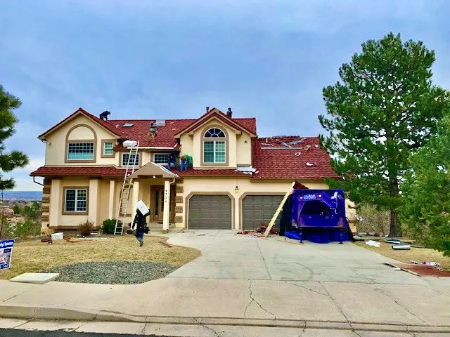 Slide of Jack Caton Roofing Team