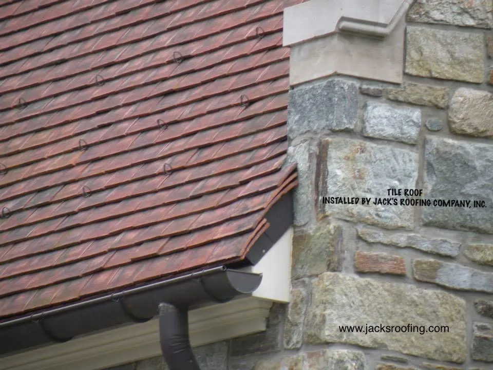 Slide of Jack's Roofing Company