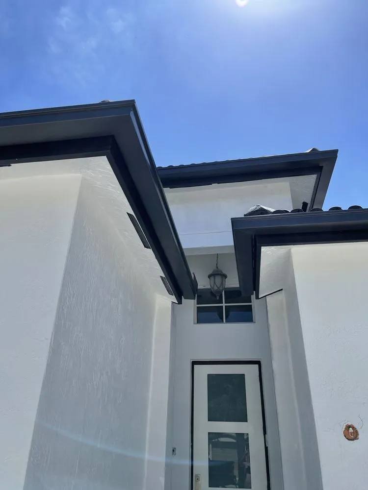 Slide of Jad Rain Gutters