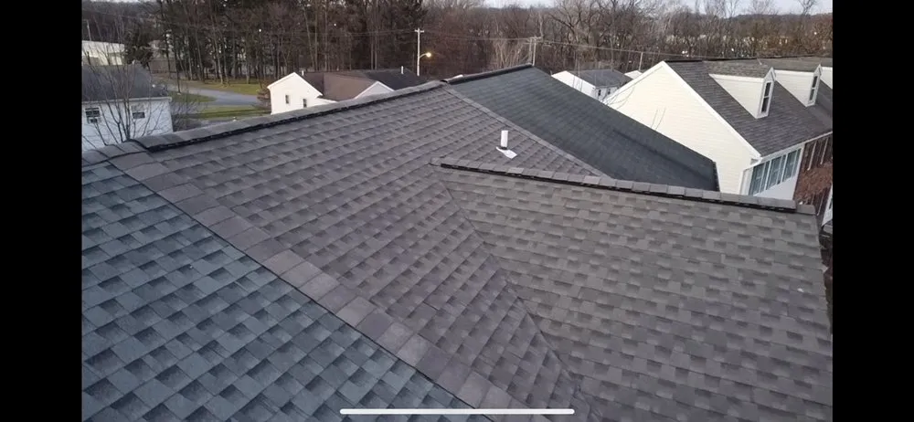 Slide of JAG Roofing and Siding