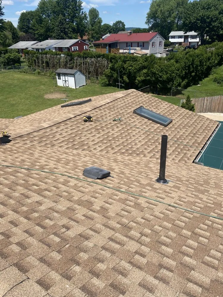 Slide of JAG Roofing and Siding