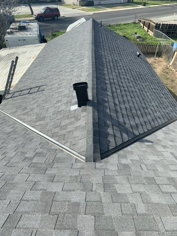 Slide of JAG Roofing