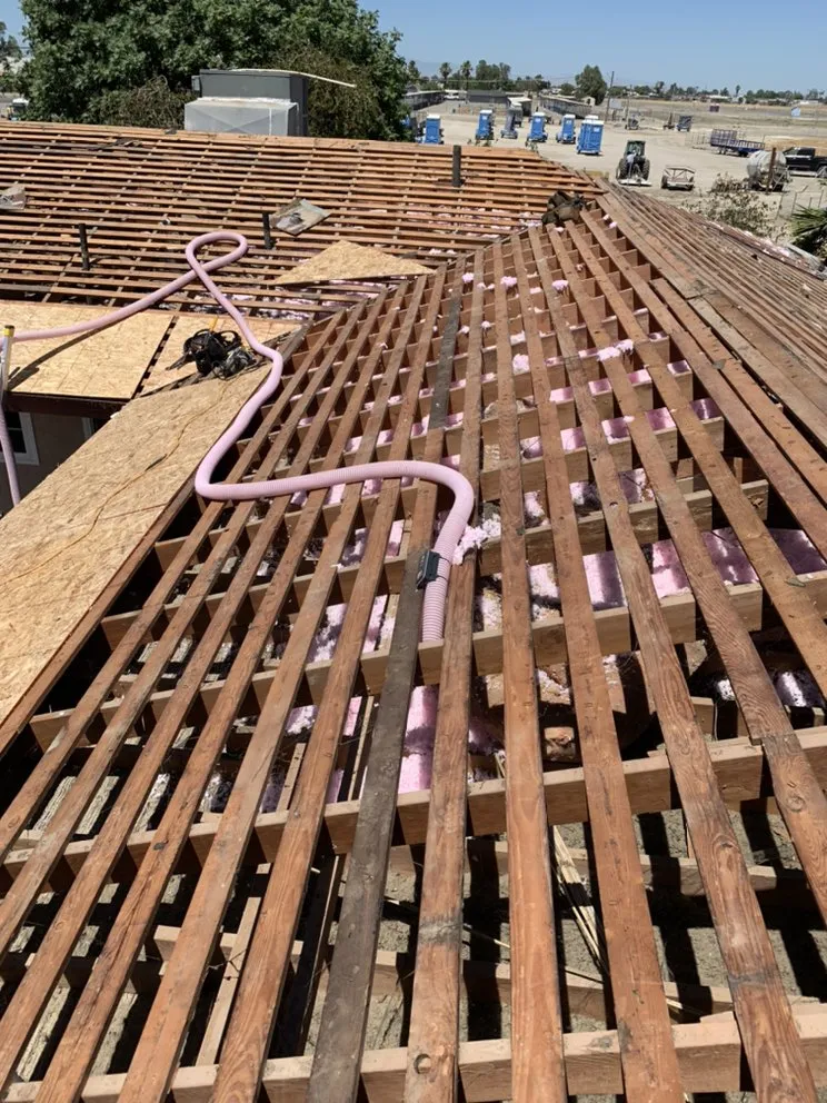 Slide of JAG Roofing