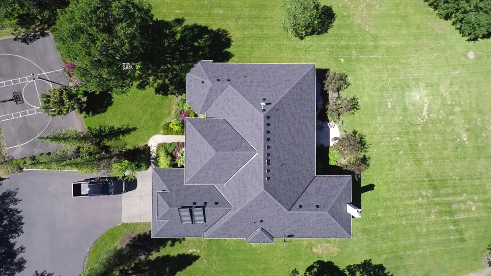 Slide of JAM Roofing