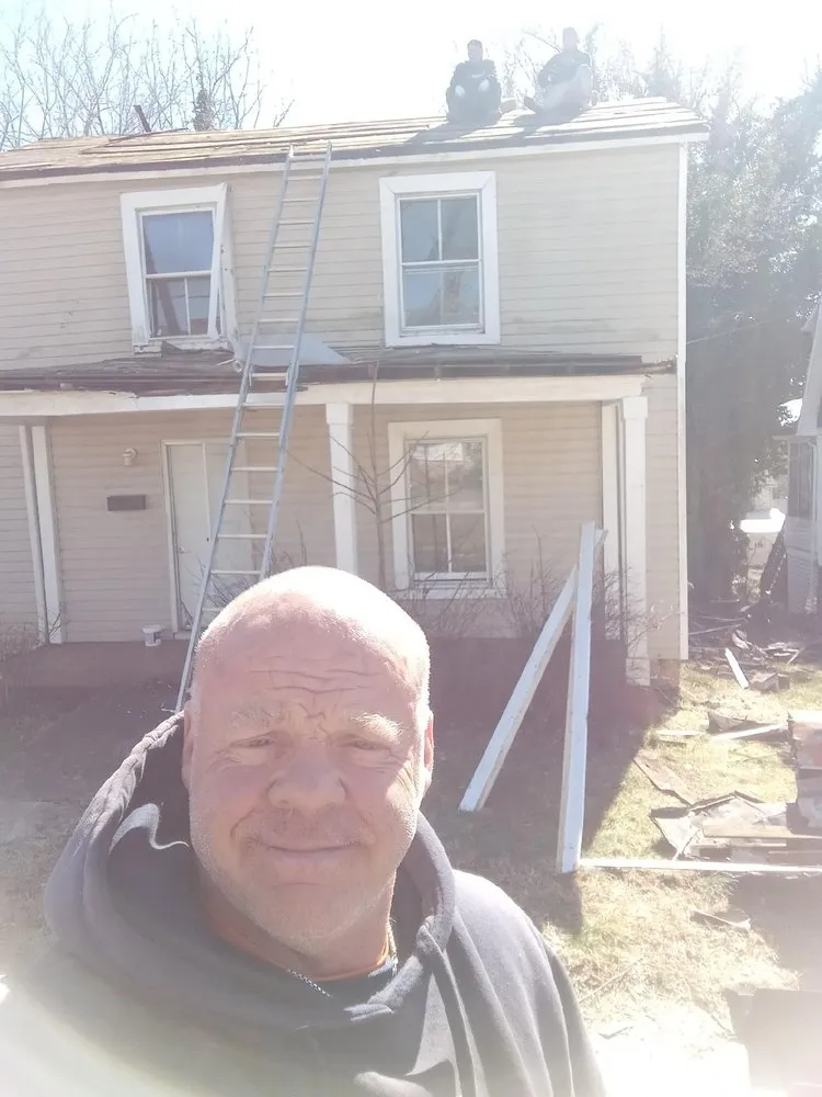 Slide of James R Jessie Roofing