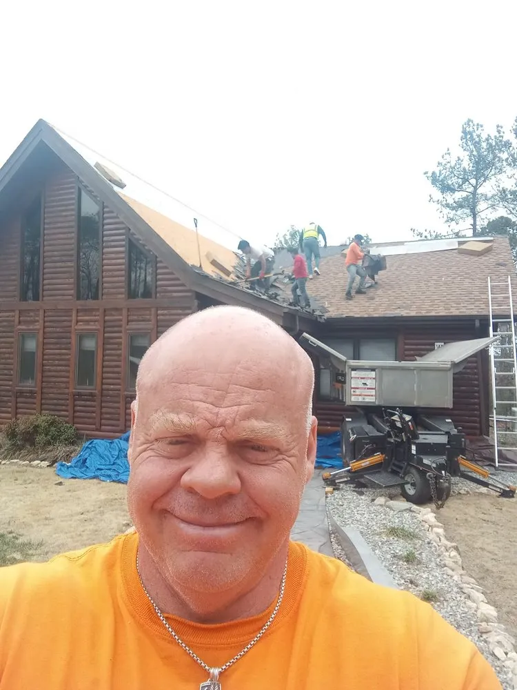 Slide of James R Jessie Roofing