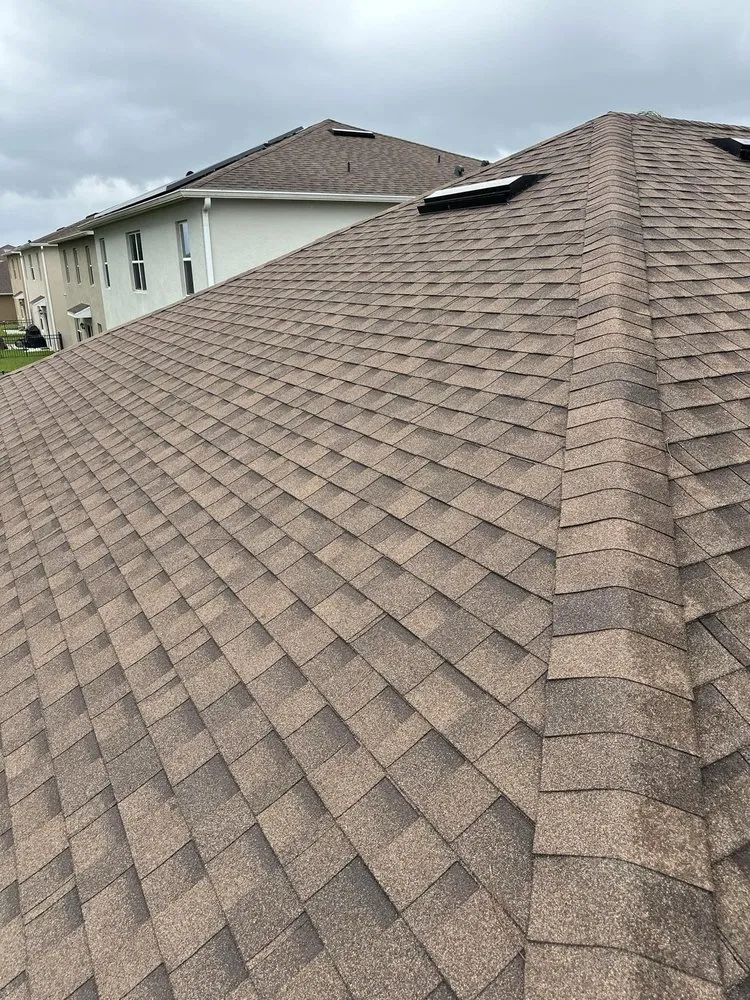 Slide of Janney Roofing